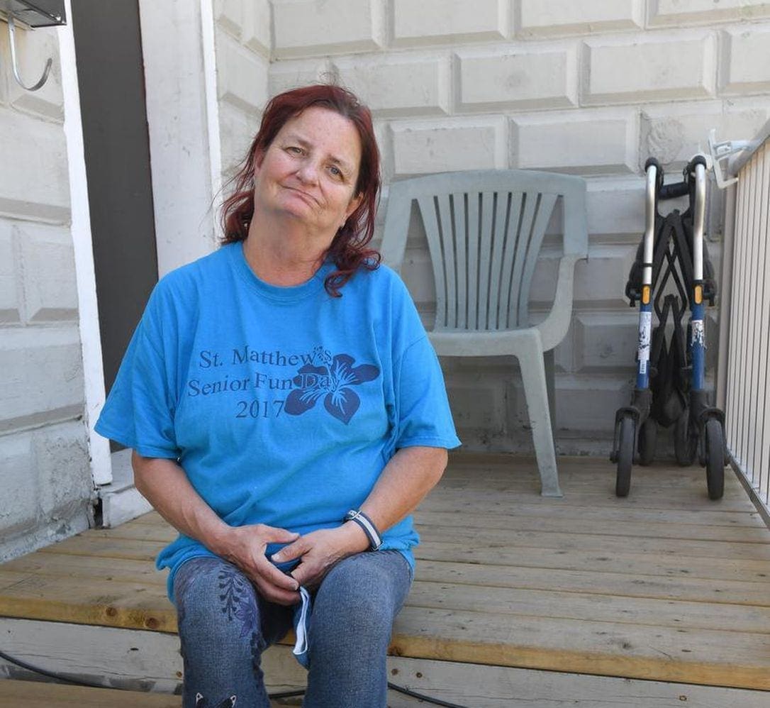 Jackie Potter sits on her porch